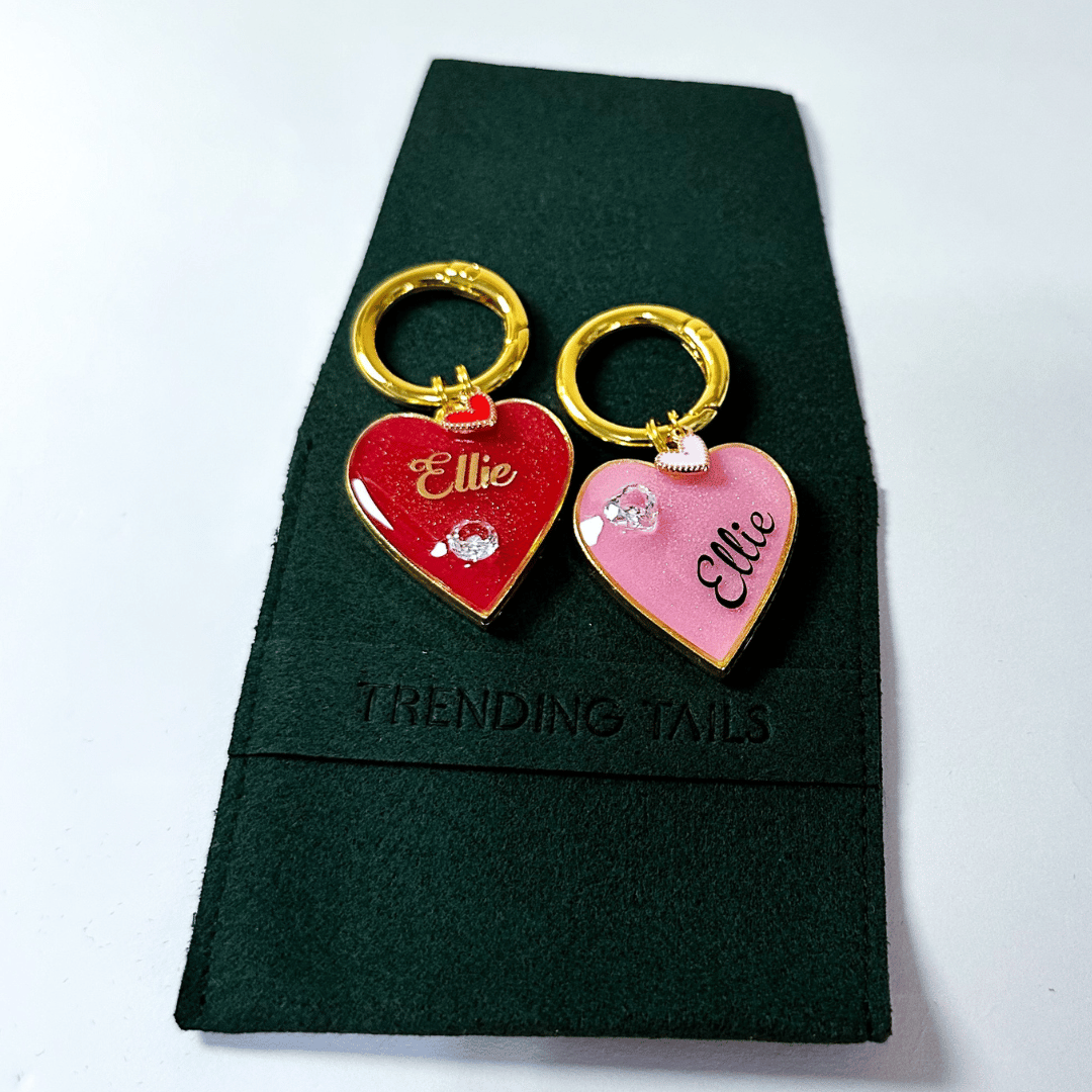 Pink heart-shaped pet ID tag with gold-plated stainless steel hardware and heart-shaped cubic zirconia crystal.