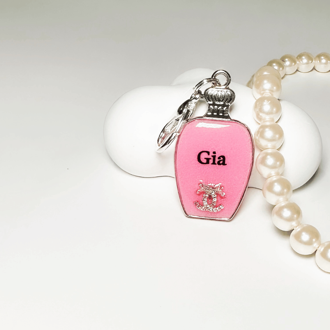 Pink perfume bottle pet ID tag with silver stainless steel hardware and Coco Chanel inspired crystal decoration, pink and silver pet ID tag.