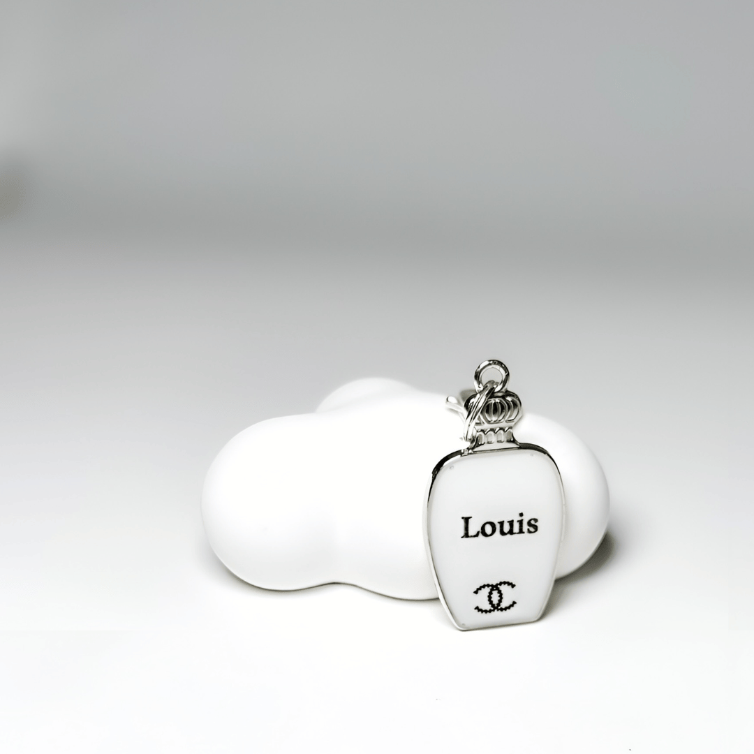 White perfume bottle pet ID tag with silver stainless steel hardware and Coco Chanel inspired pearl decoration, white and silver pet ID tag.