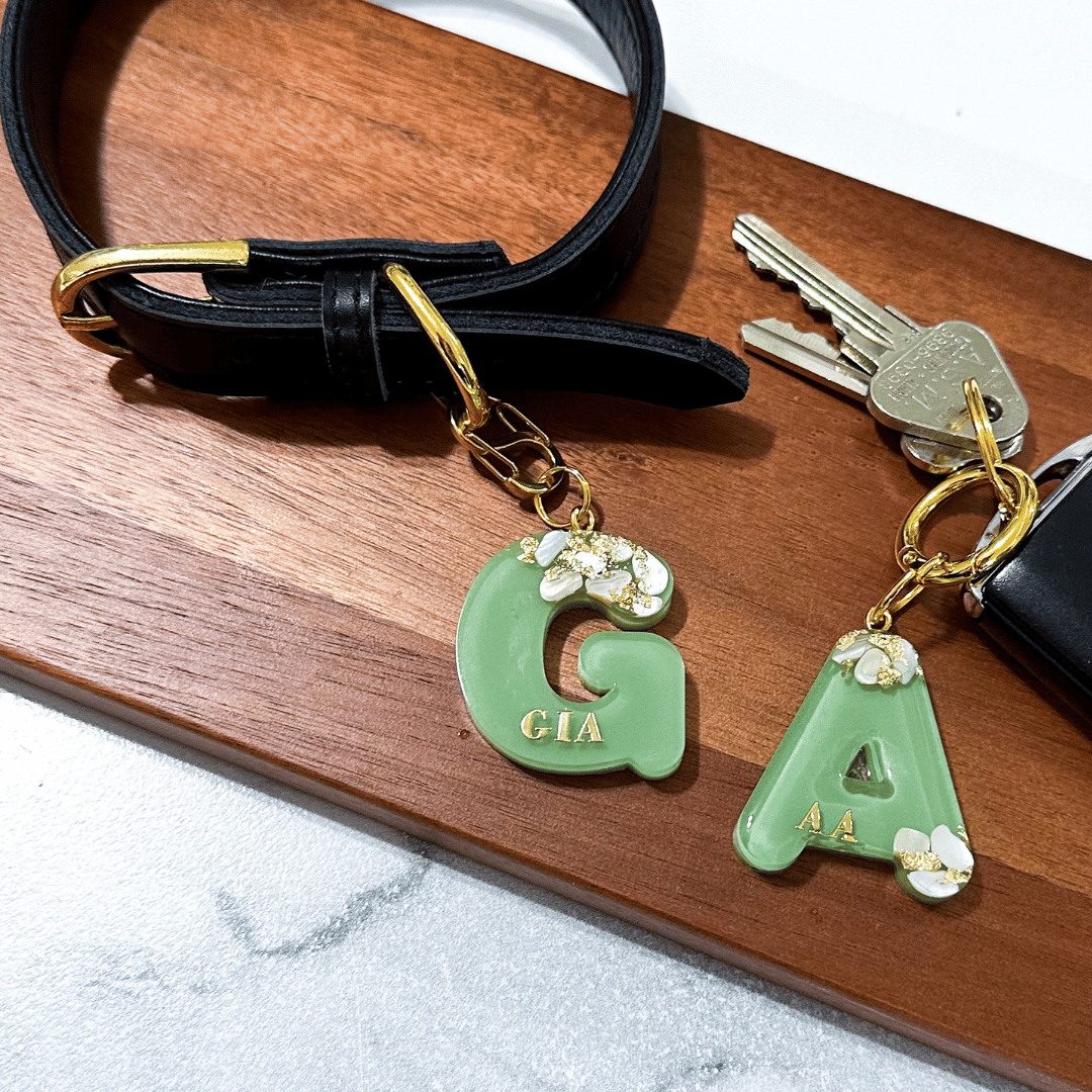 Green letter G personalised initial custom pet ID tag with gold-plated stainless steel hardware, seashells and gold flake, matching keyring bag charm.