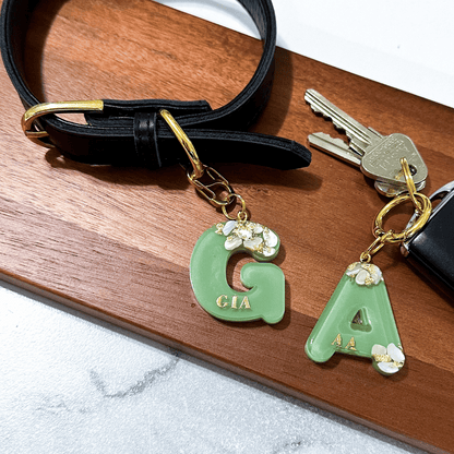 Green letter G personalised initial custom pet ID tag with gold-plated stainless steel hardware, seashells and gold flake, matching keyring bag charm.