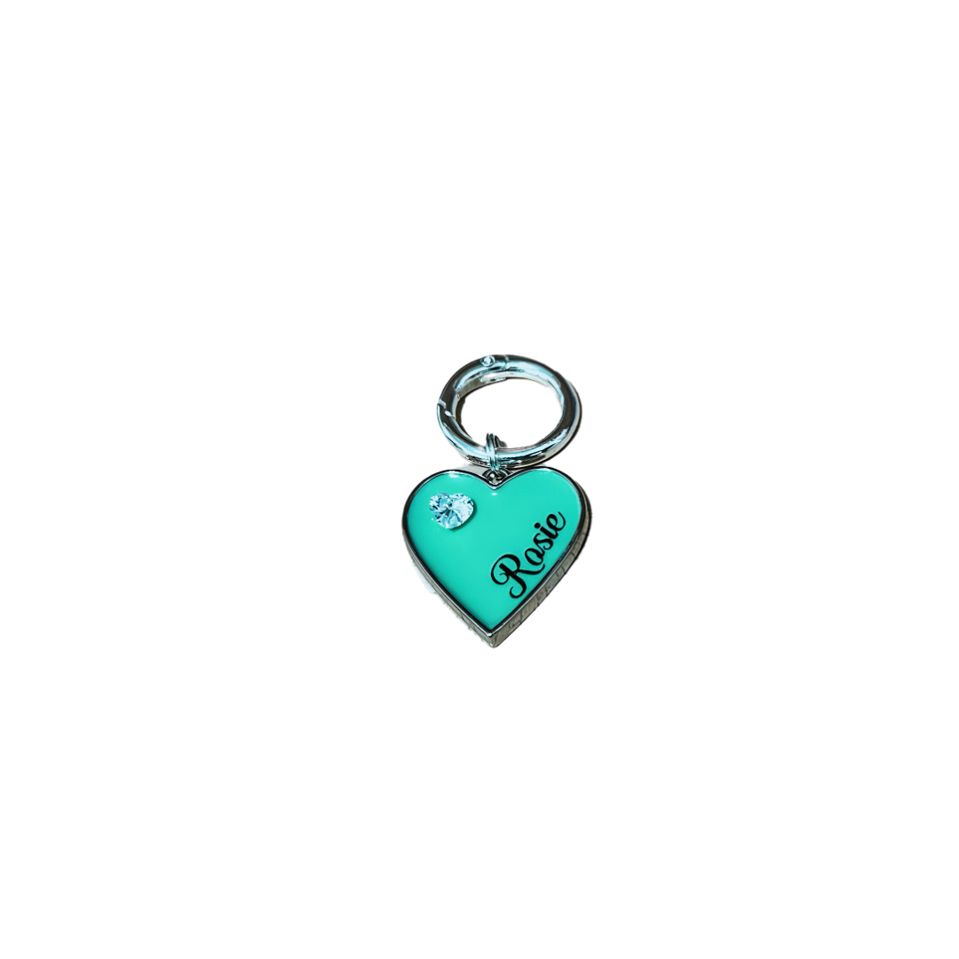 Shimmery aqua blue heart-shaped pet ID tag with silver stainless steel hardware and heart-shaped cubic zirconia crystal.