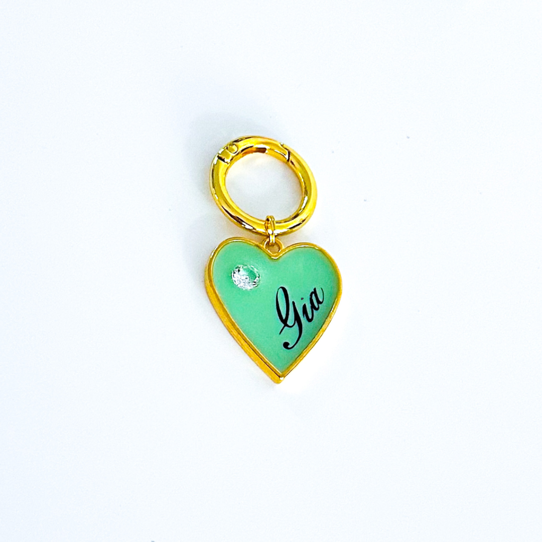 Mint heart-shaped pet ID tag with gold-plated stainless steel hardware and cubic zirconia crystal.