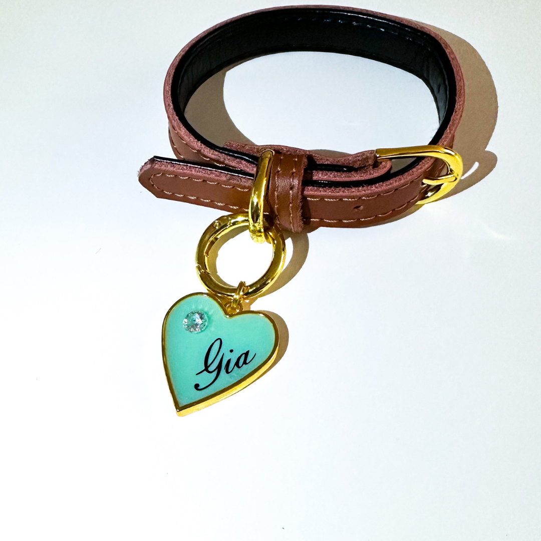 Shimmery aqua blue heart-shaped pet ID tag with gold-plated stainless steel hardware and cubic zirconia crystal.