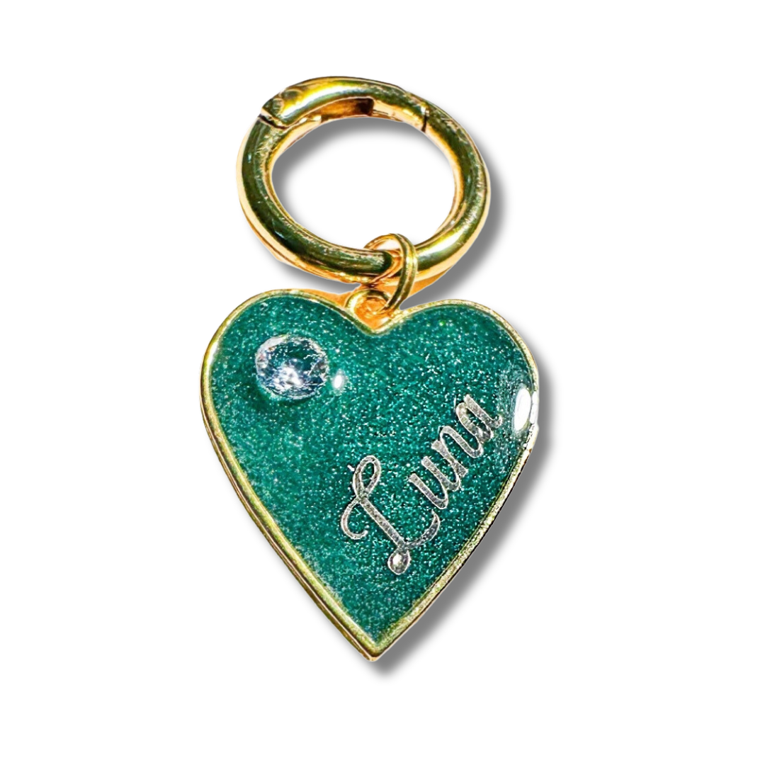 Shimmery green heart-shaped pet ID tag with gold-plated stainless steel hardware and cubic zirconia crystal, sparkly emerald green and gold pet ID tag.