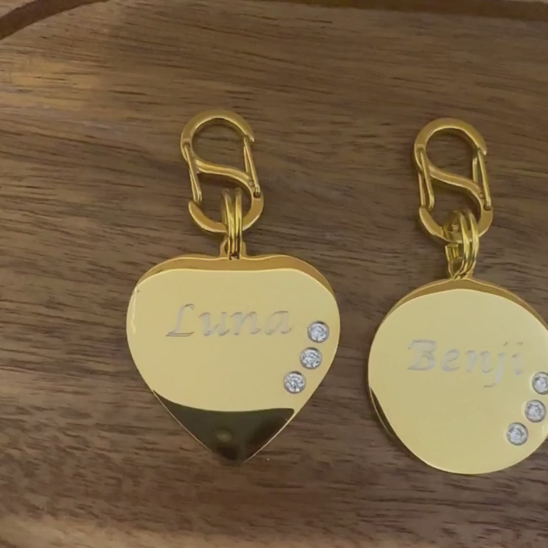 Heart-shaped and round gold-plated stainless steel pet ID tag with cubic zirconia crystals and complimentary gold-plated stainless steel S-clasp.