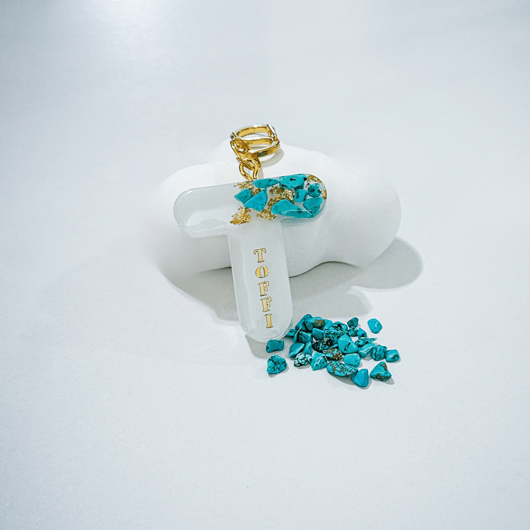 White letter T personalised initial custom pet ID tag with gold-plated stainless steel hardware, turquoise blue stones and gold flake. 